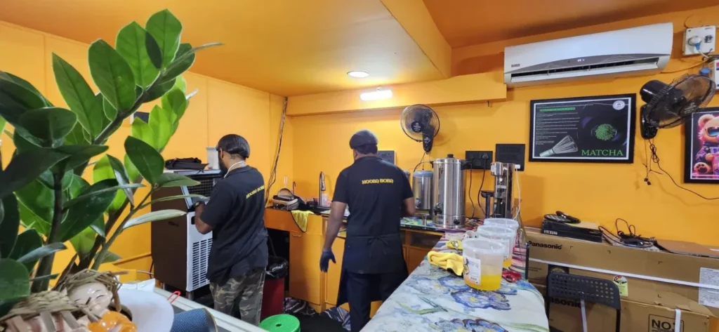 Hooba Boba staff preparing bubble tea in the shop kitchen, Vellore
